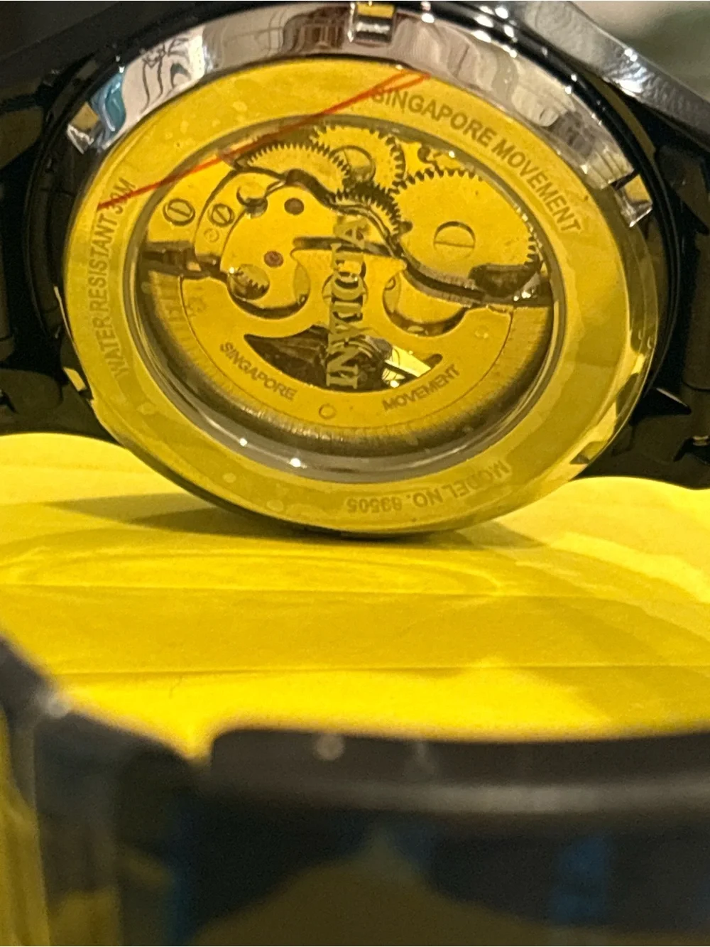 Invicta Men’s Black and Gold Skeleton Mechanical Watch